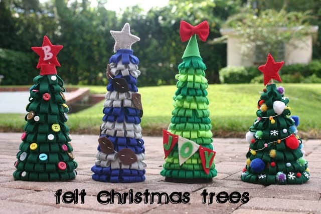 Festive Felt Christmas Trees will be darling as part of your holiday decor! Featured on Design Dazzle