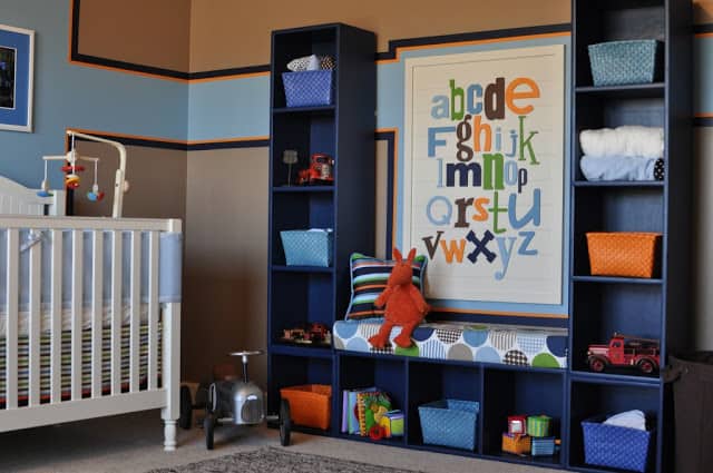 Amazing vintage nursery room designed by Lisa from The Unglamorous Mommy! I love the blue and orange stripe. Such a cute arrangement!