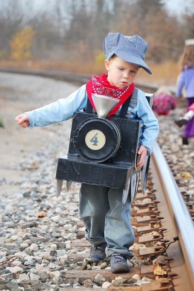 Kids Halloween Costume Ideas that are unbelievable! Here comes the most adorable train conductor!