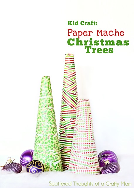 Paper Mache Christmas Trees are a fun and easy craft to do with your kids! Styrofoam cones, christmas craft paper, and a little paper mache makes festive DIY decor! Featured on Design Dazzle 