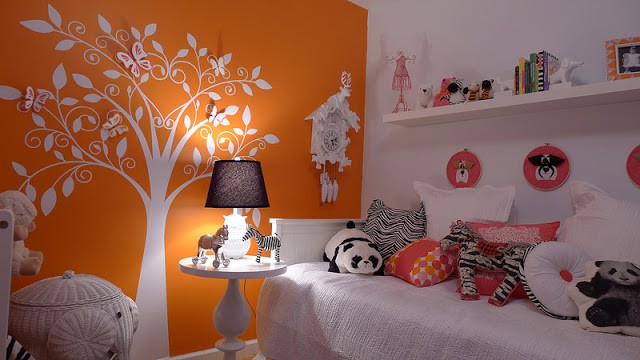 white orange and pink baby nursery