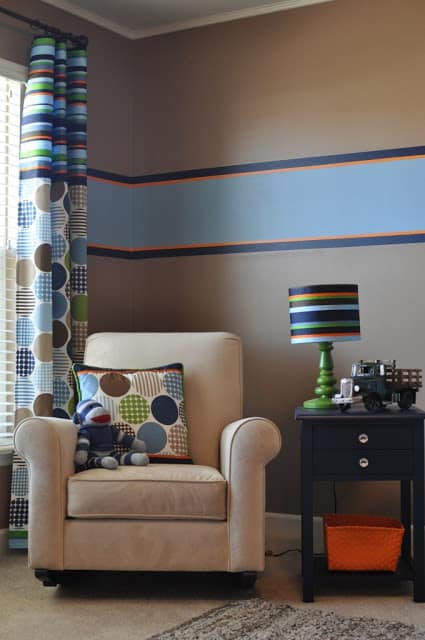 Amazing vintage truck room designed by Lisa from The Unglamorous Mommy! I love the blue and orange stripe. Such a cute arrangement!