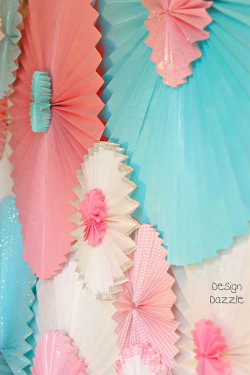 DIY: make extra large rosettes from paper window shades - Design Dazzle