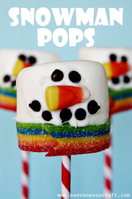 Marshmallow Snowman Pops are a festive Christmas treat for kids! Marshmallows, candy corn, chocolate chips and some rainbow licorice make a cute craft that can be gobbled up! Featured on Design Dazzle.