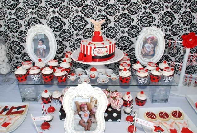 Olivia Birthday Party dessert table. Cupcakes and an adorable cake with topper! Olivia Birthday Party dessert table. Cupcakes and an adorable cake with topper!