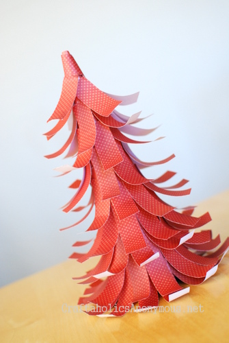 DIY: Easy Paper Christmas Tree that is so darling you won't be able to stop making them! Featured on Design Dazzle