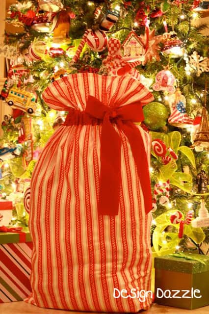 Can you believe Santa has never left wrapped Christmas gifts under the tree in our home? The reason? Santa Sacks! Kids leave the sacks empty on Christmas Eve and find them filled with gifts the next morning. Santa Sacks make for a great family tradition. #christmas #christmaskids #santasacks
