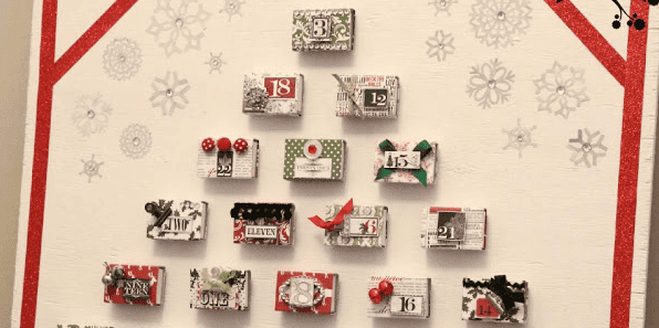 Unbelievably darling DIY matchbox advent calendar! This Christmas never looked so crafty! Featured on Design Dazzle