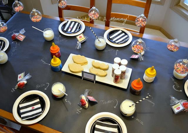 Mrs. Claus and Santa's Bash cookie table featured on Design Dazzle Mrs. Claus And Santa's Bash top view table