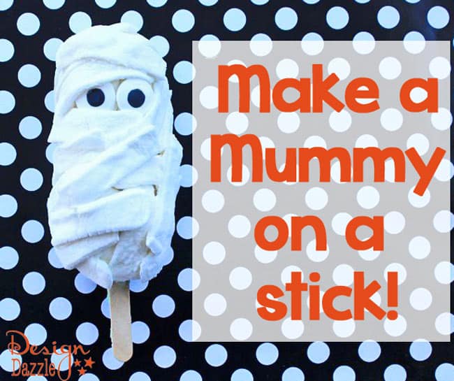 Easy No-Bake Halloween Mummy Treats - Using Snack Cakes! Make a Mummy on a stick - perfect for a kids classroom activity! Design Dazzle