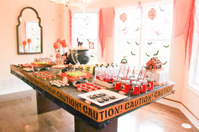 Halloween Birthday Party dessert table. The spookiest decorations on the block!