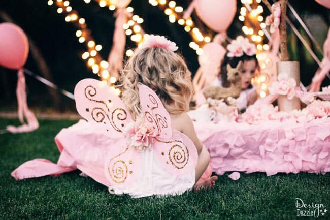 This fairy party cost less than $100 to create. There are lots of CREATIVE and AFFORDABLE do-it-yourself projects that can be easily recreated to make your own fairy party on a budget!! Design Dazzle #partyonadime #fairyparty #budgetparty