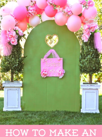 How to make an ADORABLE fairy gate + sign using a cardboard box! on Design Dazzle #fairyparty