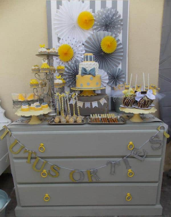 Tutus or Ties Gender Reveal party with a yellow and gray theme