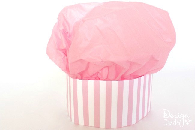 No-Sew Cupcake Baker Halloween Costume! Pink apron, tutorial on the chef hat and dollar store accessories help make this an INEXPENSIVE and EASY costume! | DIY kids halloween costumes | DIY halloween costumes | halloween costume ideas for kids | no sew halloween costumes | easy homemade halloween costumes || Design Dazzle #DIYhalloweencostumes