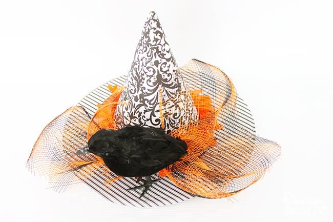 Quick and easy witches hat fascinator for mom, teen, or little girl costume! Designdazzle.com #diyhalloweencostume #easyhalloween