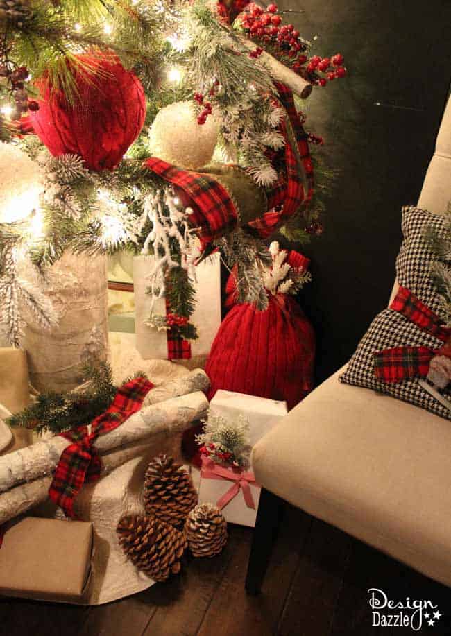 Repurpose an old sweater into a gift bag. Love the warm cozy look this sweater brings to our Christmas decor. Reuse it every year to wrap gifts. Use the glue gun or sew it! Design Dazzle #repurposed