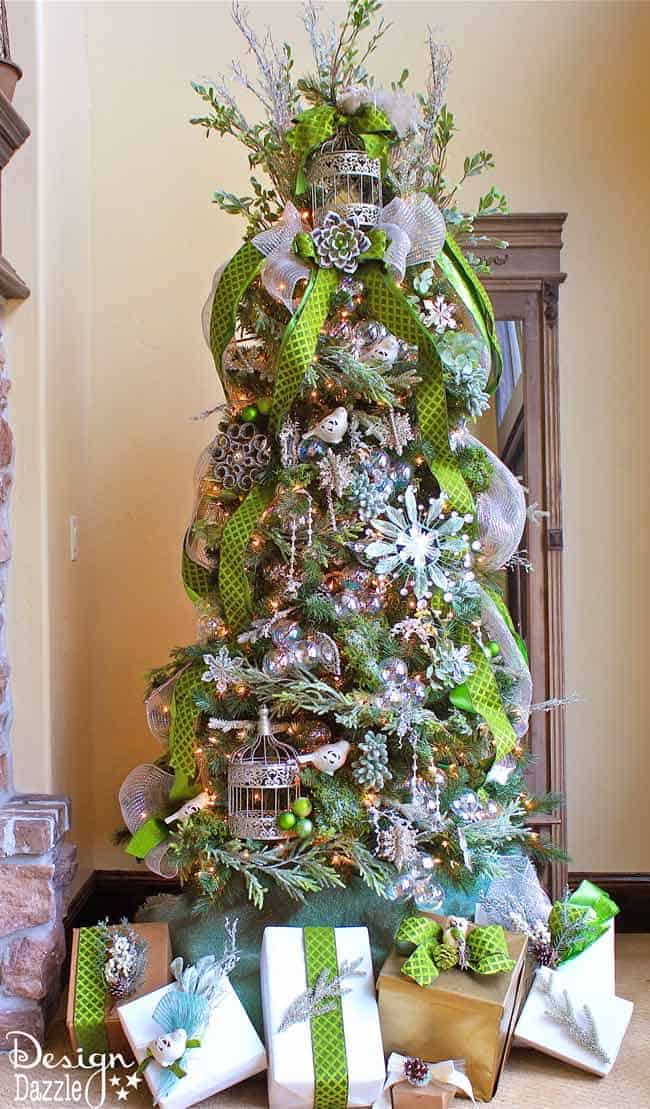 Silvery sage, apple green, floral, glitter, moss, birds, and more! This is what a Jeweled Forest Christmas Tree looks like. Designed by Toni of Design Dazzle. #christmastrees #dreamtree #christmastreedecorating