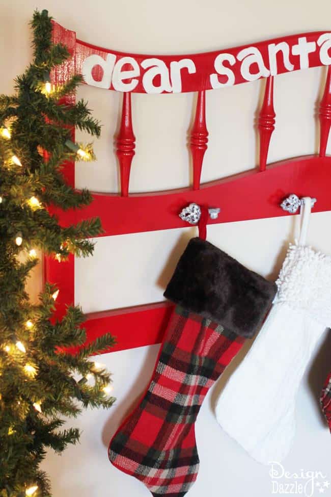 Don't have a fireplace with a mantel? Looking for a creative new way to display your cute stockings? Here's a fun DIY project to make a fabulous Christmas Stocking Holder. #repurposed #christmasdiy #christmasstockingholder