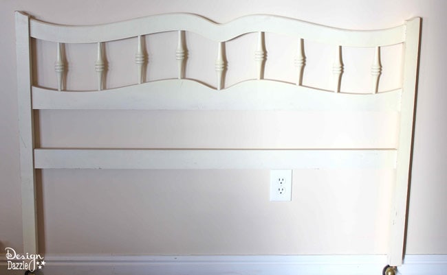 headboard repurposed into Christmas stocking holder