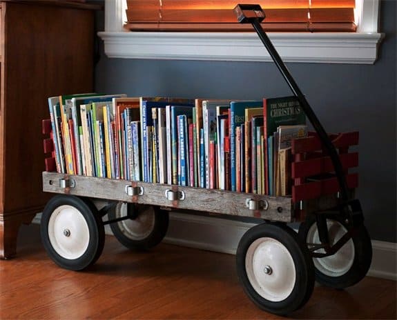 Use an old wagon as storage for books or toys. See more repurposing ideas for kids rooms on Design Dazzle!