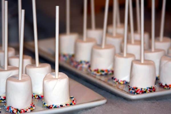 Marshmallows dipped in sprinkles for an Elf Workshop Party!