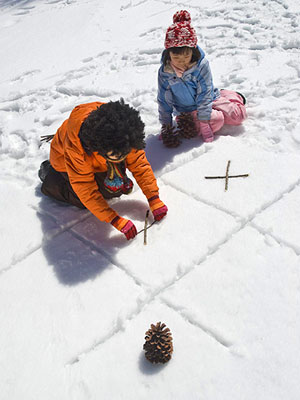 Play tic tac toe in the snow for a fun outdoor winter activity