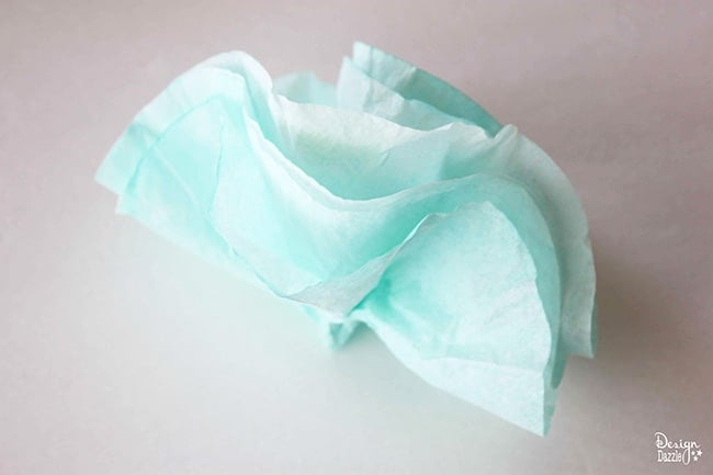 Check out this simple coffee filter flower tutorial on Design Dazzle. #DIY #partydecor #coffeefilterflowers