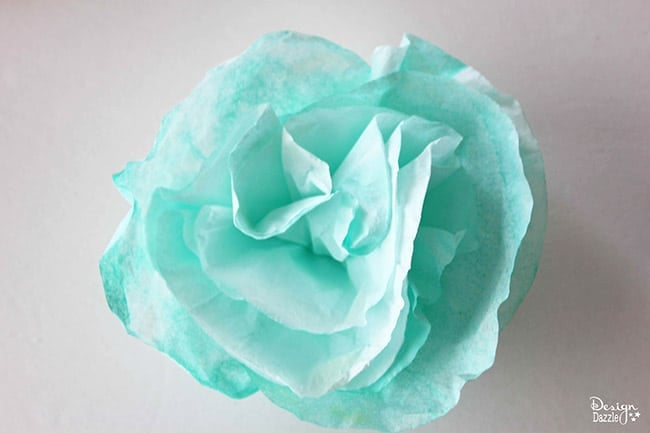 Check out this simple coffee filter flower tutorial on Design Dazzle. #DIY #partydecor #coffeefilterflowers