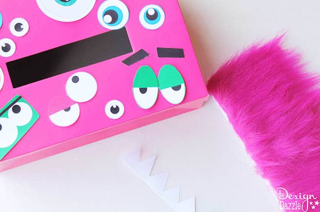 Make this fun Monster Valentine Card Holder! It's so easy, you and your kids will love it. Check it out on Design Dazzle.