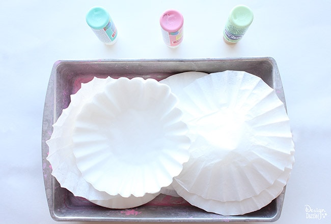 Dying coffee filters has never been simpler! Find the full coffee filter flower tutorial on Design Dazzle.