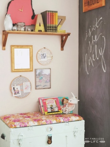 I adore this chalkboard wall. This is a BEAUTIFUL eclectic kids room!