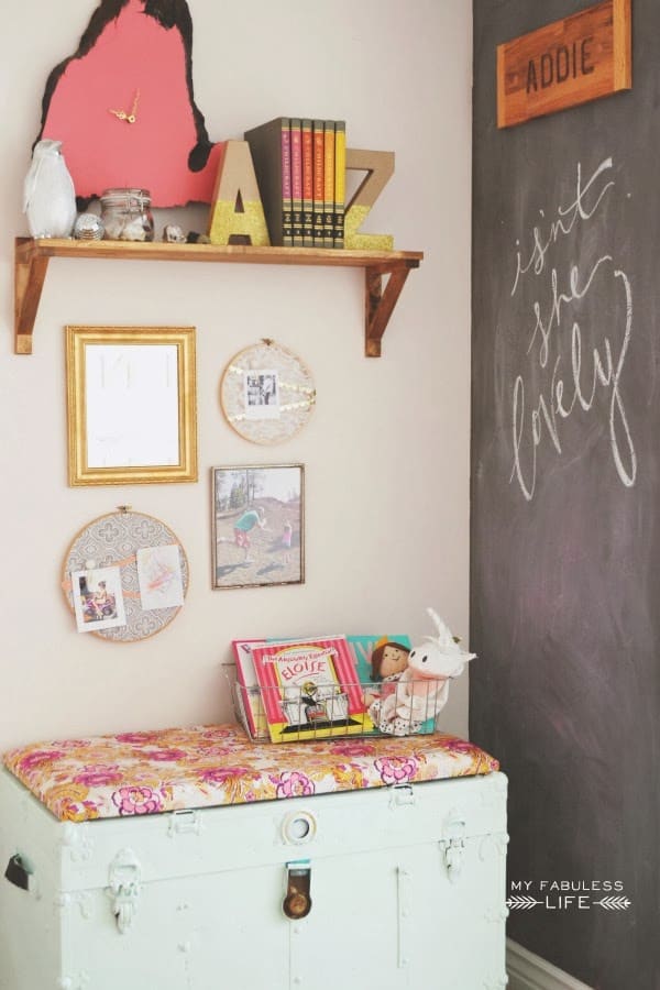 I adore this chalkboard wall. This is a BEAUTIFUL eclectic kids room!