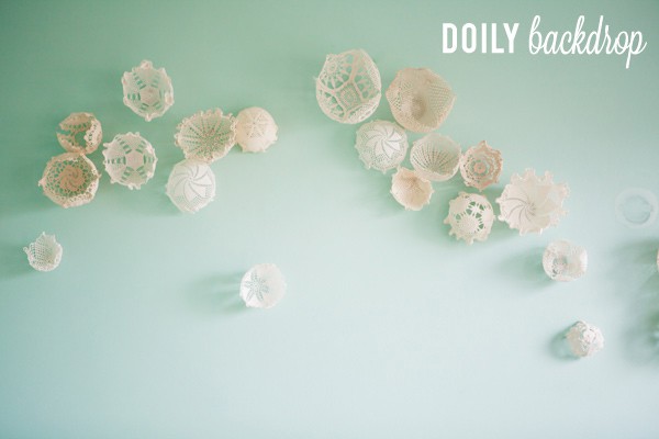 This is a gorgeous DIY photo backdrop! Doilies are beautiful!