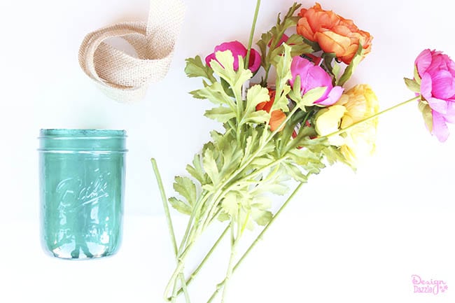 Create a beautiful tinted mason jar centerpiece for your farm chic bash! See how on Design Dazzle.