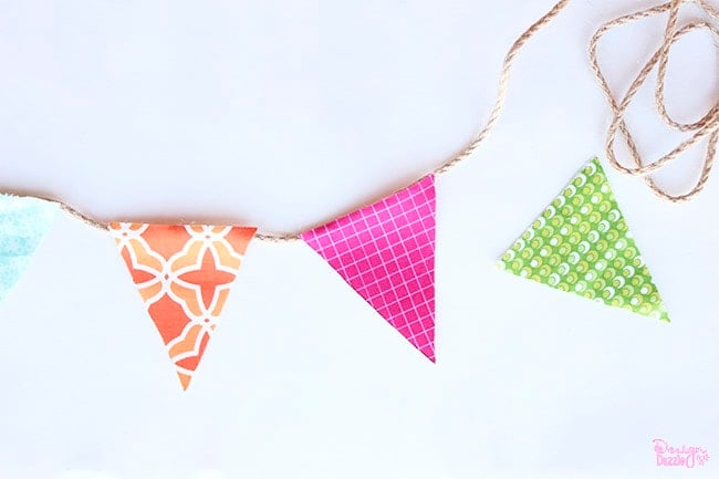 Making a mini fabric banner is simple! Check it out on Design Dazzle.