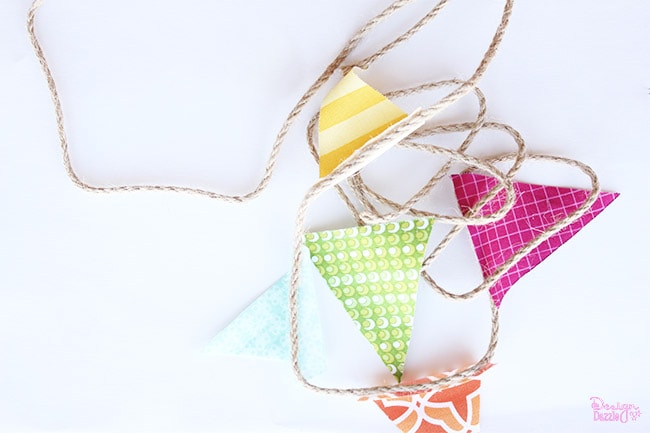 Making a mini fabric banner is simple! Check it out on Design Dazzle.