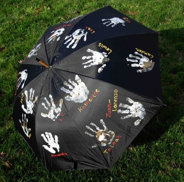 Handprints on an umbrella for a fun teacher appreciation craft and gift idea.