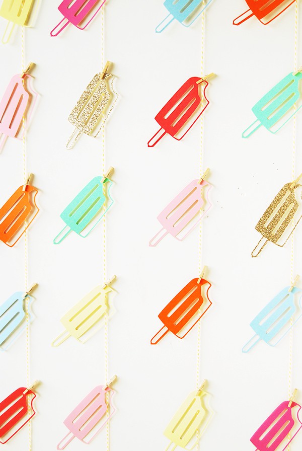 Create your own colorful popsicle backdrop for your end of summer party