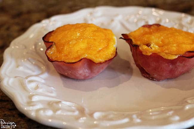 Looking for easy breakfast ideas? You'll love these ham, egg, and cheese muffin cups! Recipe on Design Dazzle.
