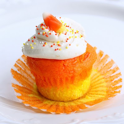 Yellow, Orange, and white cupcakes