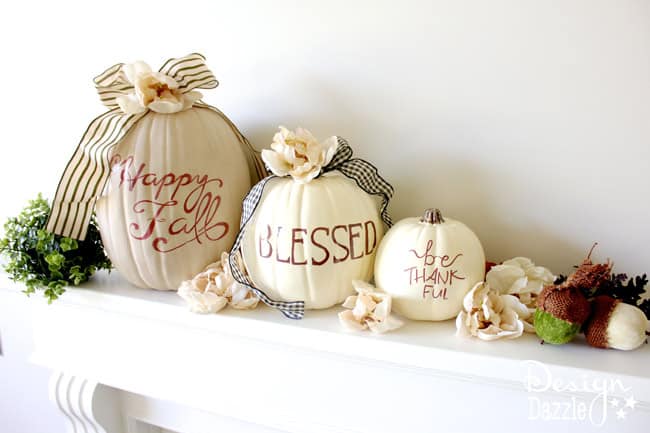 The most AWESOME idea about these pumpkins is they are TWO-SIDED! One side is for Halloween and one side is for Fall!! Free printables included. | DIY pumpkin decorating ideas | sharpie pumpkin tutorial | how to make sharpie art pumpkins | how to decorate a pumpkin | pumpkin decorating tips || Design Dazzle