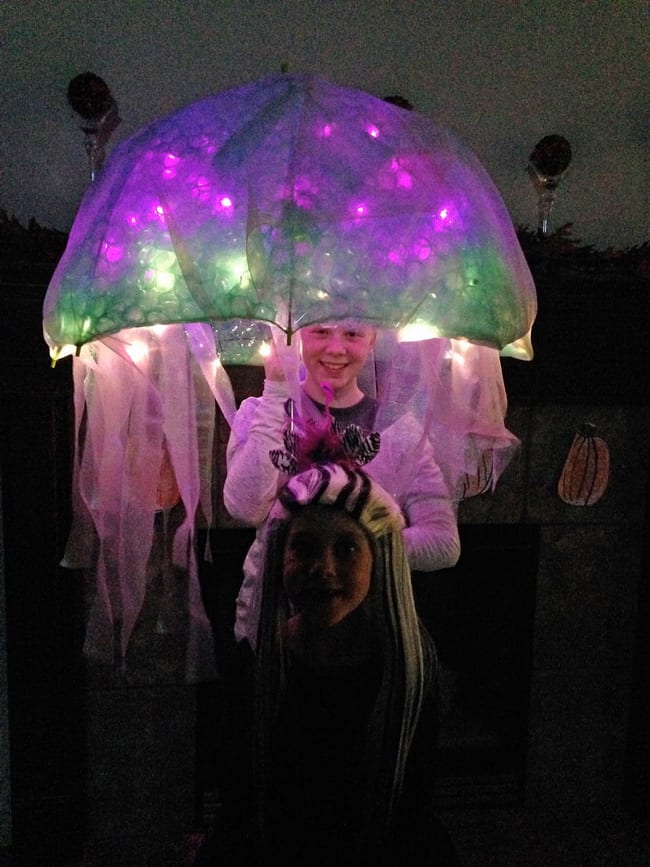 DIY Jellyfish Halloween Costume that is battery operated. Easy no-sew tutorial to create a darling and super fun halloween costume. Shared on Design Dazzle