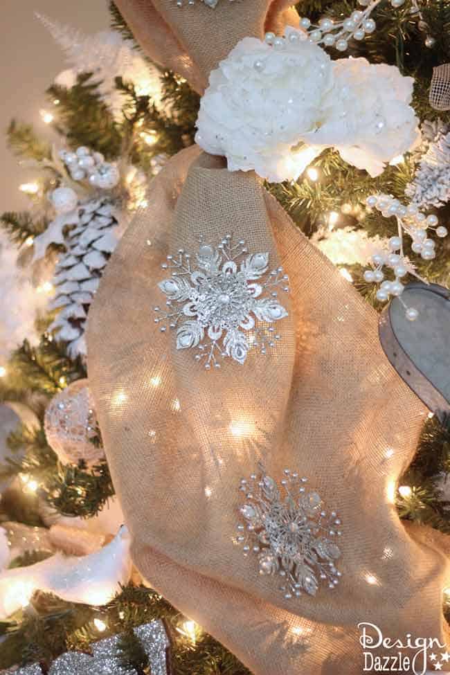 Winter Wonderland Glam Christmas Tree designed by Toni Roberts of Design Dazzle. Snow tipped branches, gold hydrangeas, white roses, lots of bling and touches of galvanized metal create this Winter Wonderland Glam Tree.