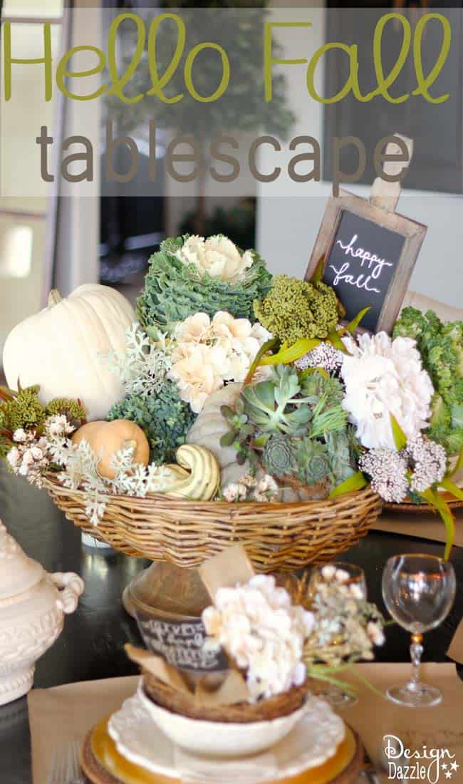 Succulents, ornamental cabbages, winter squash used with neutrals and a touch of glitz to create a stunning Thanksgiving tablescape. || thanksgiving decor | tablescape ideas for thanksgiving | decorating for fall | fall table decor | thanksgiving table decor || Design Dazzle #thanksgivingdecor #falltablescape #falltabledecor