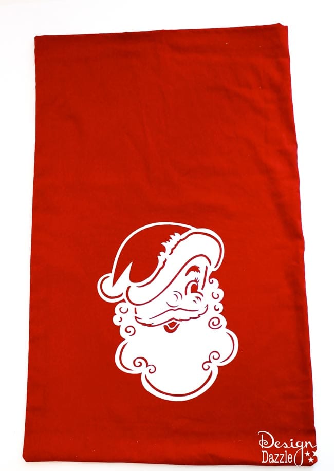 Red tab top curtains made into Santa Sacks (gift bags). Design Dazzle