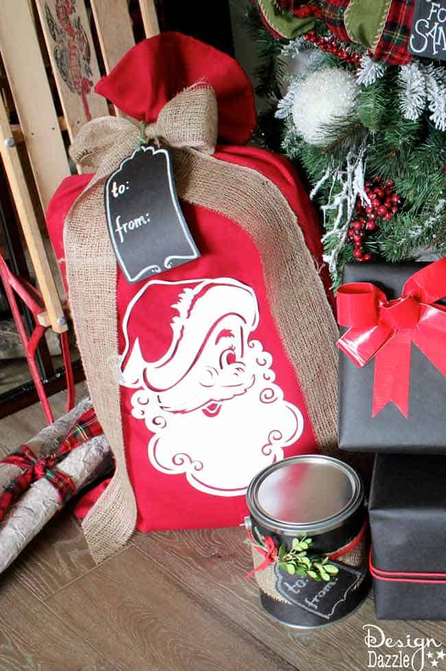 This Santa Sack is made out of curtains!! It is easy to make and perfect for wrapping gifts or starting a new Christmas tradition. Design Dazzle