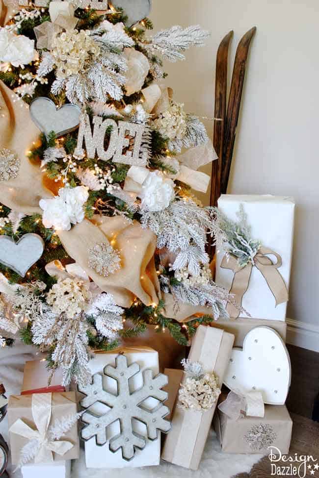 Winter Wonderland Glam Christmas Tree designed by Toni Roberts of Design Dazzle. Snow tipped branches, gold hydrangeas, white roses, lots of bling and touches of galvanized metal create this Winter Wonderland Glam Tree. #MichaelsMakers