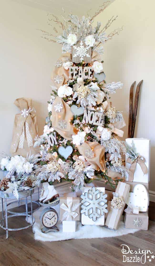 Winter Wonderland Glam Christmas Tree designed by Toni Roberts of Design Dazzle. Snow tipped branches, gold hydrangeas, white roses, lots of bling and touches of galvanized metal create this Winter Wonderland Glam Tree.