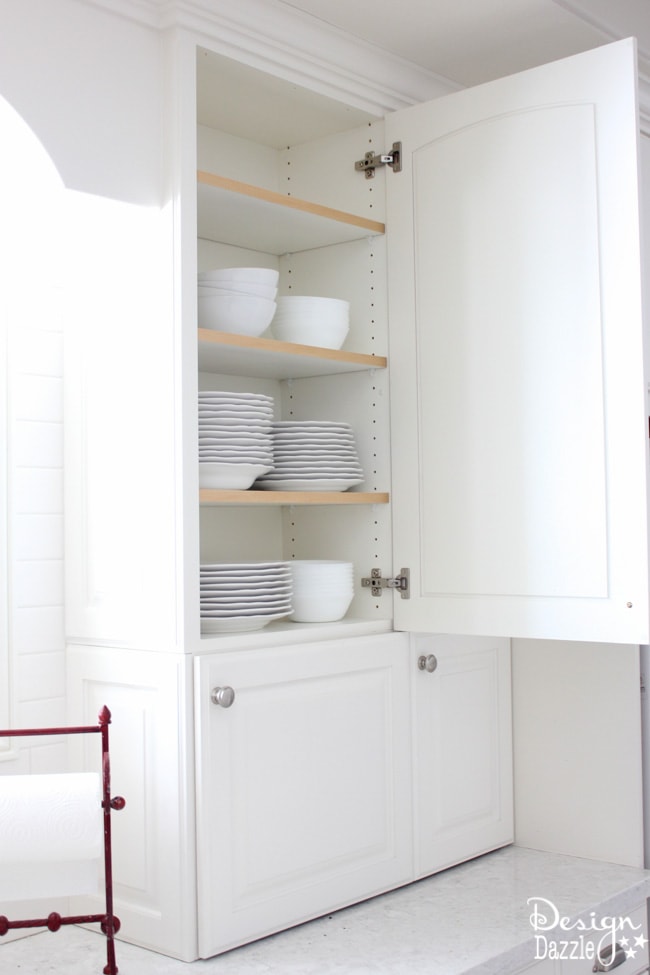  The INSIDE of the cabinets are pretty plain and quite dull. Here is an unexpected detail and fun surprise when you open the kitchen cabinet doors! It went from boring and plain - to a party on the inside! I smile every time I open the door! See the details on how to create this for more than a kitchen a craft room, bathroom, bedroom, etc. Design Dazzle